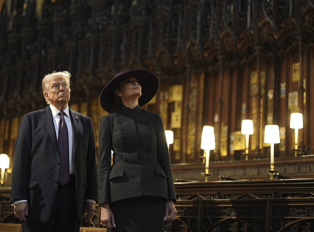 President Donald Trump and first lady Melania Trump attend their visit to St George's Chapel at Windsor Castle, in Windsor, England, Wednesday Sept. 17, 2025. (Aaron Chown/Pool Photo via AP)