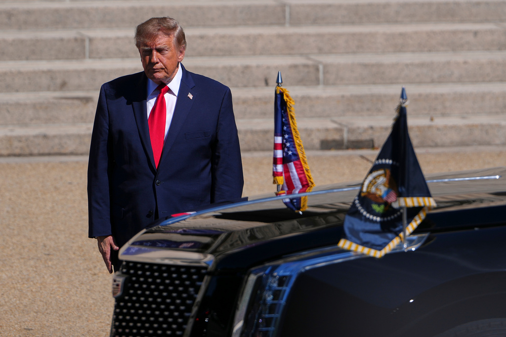 President Donald Trump arrives at the National Archives Museum to greet China's President Xi Jinping and his wife Peng Liyuan, Friday, Sept. 25, 2026, in Washington. (AP Photo/Julia Demaree Nikhinson)