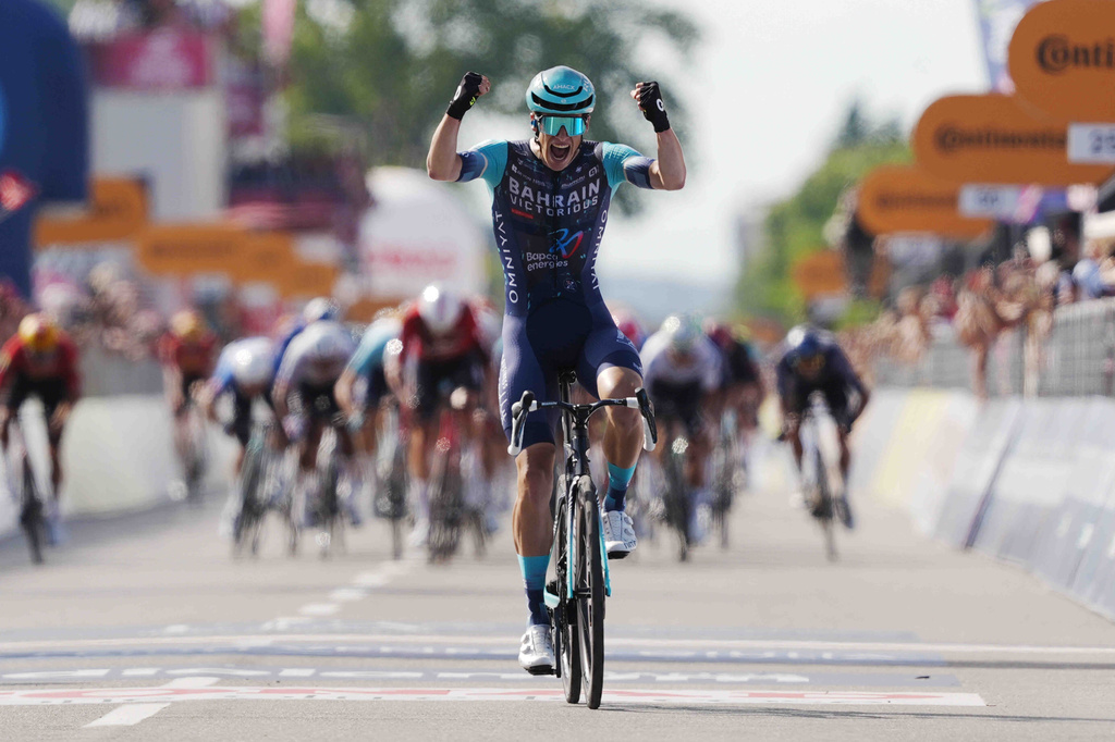 Belgium's Alec Segaert of Bahrain Victorious crosses the finish line to win the 12th stage of the Giro d'Italia cycling race, from Imperia to Novi Ligure, Italy, Thursday, May 21, 2026. (Massimo Paolone/LaPresse via AP)