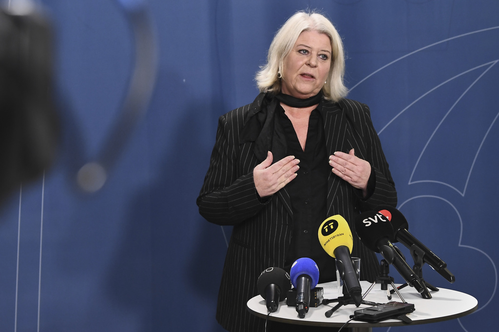 Minister of Social Services Camilla Waltersson Grönvall meets the media after meeting with e-commerce companies, children's rights organizations and authorities following the high-profile reporting on sex dolls depicting children, in Stockholm, Friday, Nov. 28, 2025. (Lars Schröder/TT News Agency via AP)