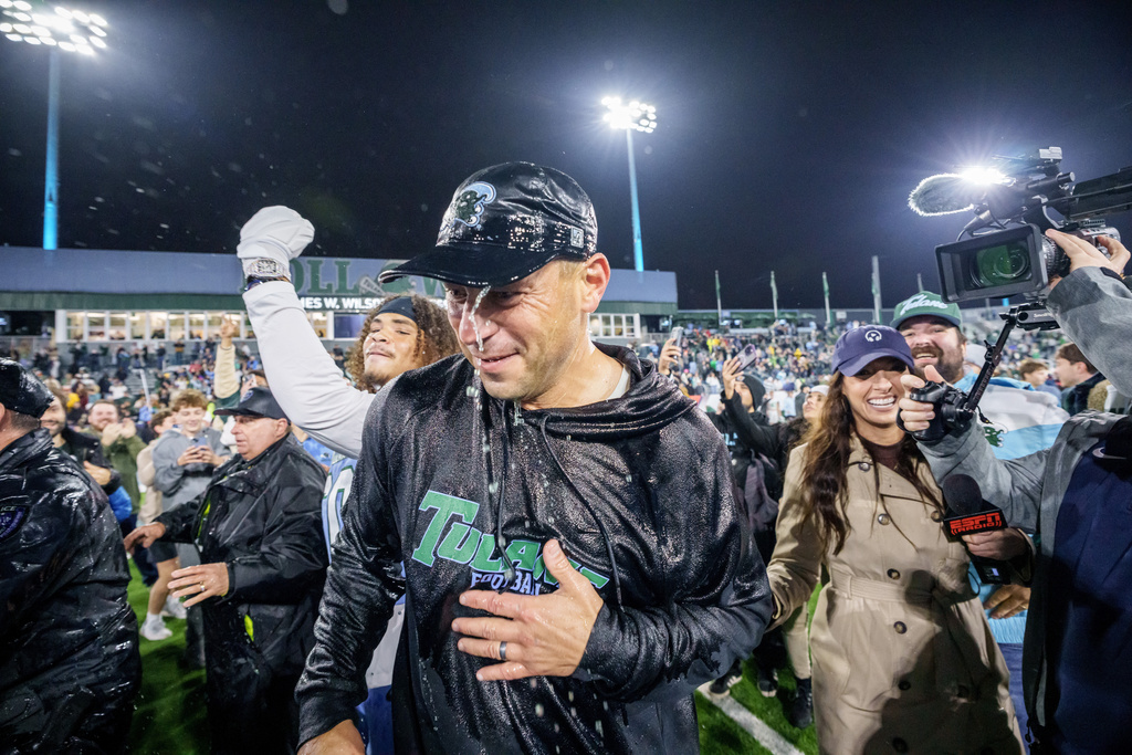 Tulane head coach Jon Sumrall reacts after winning the American Conference championship NCAA college football game against North Texas in New Orleans, Friday, Dec. 5, 2025. (AP Photo/Matthew Hinton)