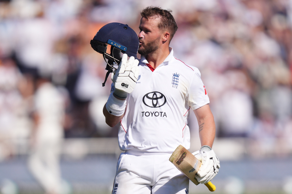 England's Ben Duckett celebrates reaching his century during day two of the Third Rothesay Test at Trent Bridge Cricket Ground, Nottingham, Friday, June 26, 2026. (Mike Egerton/PA via AP)