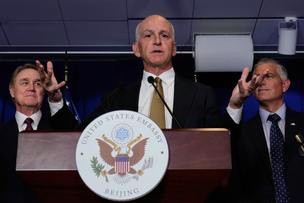 U.S. Rep. Adam Smith, D-Wash, center, speaks during a press conference at the U.S. Embassy in Beijing, China, Tuesday, Sept. 23, 2025. (AP Photo/Mahesh Kumar A.)