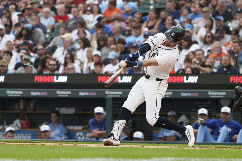 Detroit Tigers' Zach McKinstry hits a single during the third inning of a baseball game against the Kansas City Royals Saturday, Aug. 23, 2025, in Detroit. (AP Photo/Josh Boland )