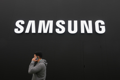 A person walks by a logo of Samsung Electronics at an exhibition hall for the Asia-Pacific Economic Cooperation (APEC) in Gyeongju, South Korea, Thursday, Oct. 30, 2025. (AP Photo/Lee Jin-man) A person walks by a logo of Samsung Electronics at an exhibition hall for the Asia-Pacific Economic Cooperation (APEC) in Gyeongju, South Korea, Thursday, Oct. 30, 2025. (AP Photo/Lee Jin-man)