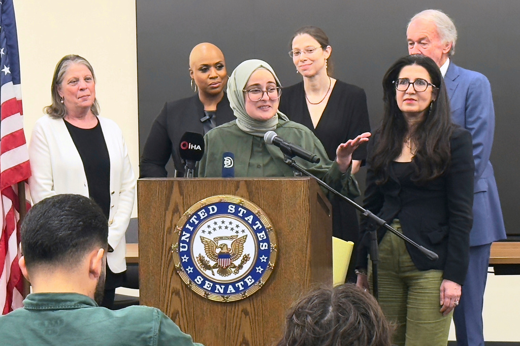 FILE - Tufts University student from Turkey, Rumeysa Ozturk, who was arrested by immigration agents while walking along a street in a Boston suburb, talks to reporters on arriving back in Boston, May 10, 2025, a day after she was released from a Louisiana immigration detention center on the orders of a federal judge. (AP Photo/Rodrique Ngowi, File)