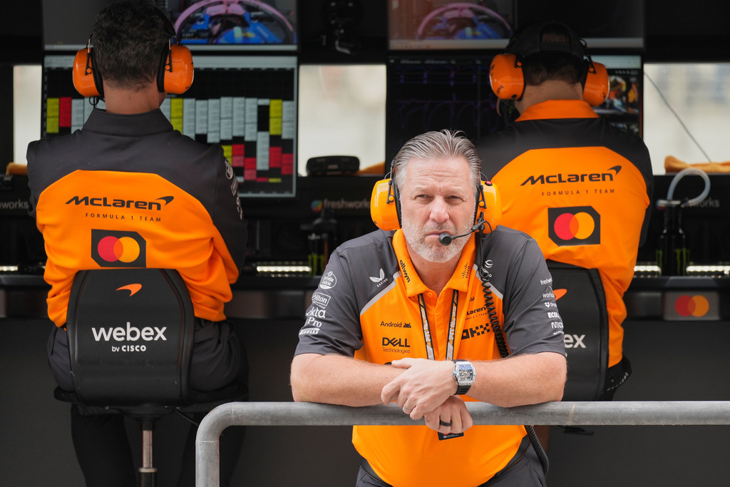 FILE - McLaren chief Zak Brown listens to radio during a first practice for the he Abu Dhabi Formula One Grand Prix in Abu Dhabi, United Arab Emirates, Friday, Dec. 5, 2025. (AP Photo/Darko Bandic, file)