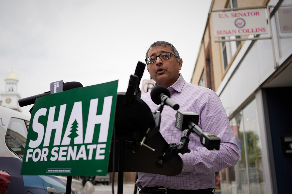 Dr. Nirav Shah, Democratic candidate for U.S. Senate, speaks to reporters outside an office for Sen. Susan Collins, R-Maine, a day after a shooting involving U.S. Immigration and Customs Enforcement, Tuesday, July 14, 2026 in Biddeford, Maine. (AP Photo/Robert F. Bukaty)