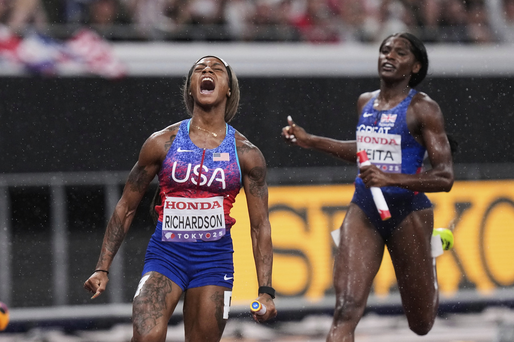 United States' Sha'Carri Richardson reacts during the women's 4 X 100 meters relay at the World Athletics Championships in Tokyo, Sunday, Sept. 21, 2025. (AP Photo/Eugene Hoshiko)