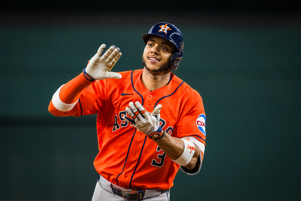 Houston Astros' Jeremy Peña celebrates a home run during the first inning of a baseball game against the Texas Rangers, Thursday, May 28, 2026, Arlington, Texas. (AP Photo/Jessica Tobias)