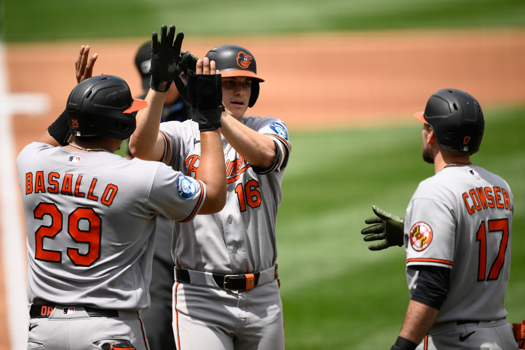 Baltimore Orioles' Coby Mayo (16) celebrates after his two-run home run with Samuel Basallo (29) and Colton Cowser (17) during the second inning of a baseball game, Sunday, May 17, 2026, in Washington. (AP Photo/Nick Wass)