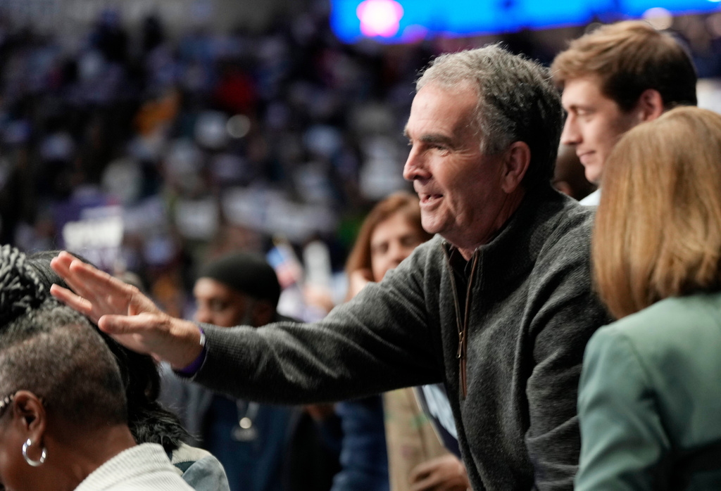 Former Virginia Gov. Ralph Northam, waves to supporters during a rally with Virginia Democratic gubernatorial candidate Abigail Spanberger and former President Barack Obama, Saturday, Nov. 1, 2025, in Norfolk, Va. (AP Photo/Steve Helber)
