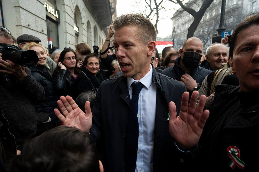 FILE - Péter Magyar, the former husband of one-time justice minister and Orbán ally Judit Varga meets with people in the crowd after his speech on Hungary's National Day in Budapest on Friday, March 15. 2024. (AP Photo/Denes Erdos, File)