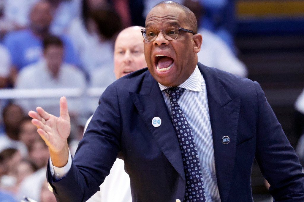 North Carolina head coach Hubert Davis directs his team against Kansas during the first half of an NCAA college basketball game Friday, Nov. 7, 2025, in Chapel Hill, N.C. (AP Photo/Chris Seward)