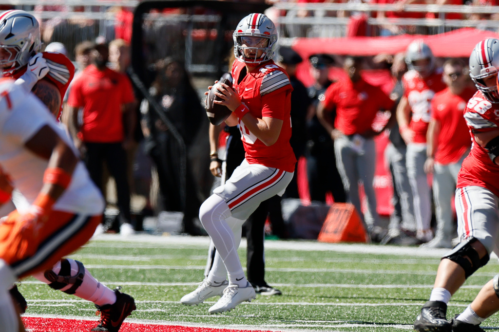 Ohio State quarterback Julian Sayin drops back to pass against Illinois during the first half of an NCAA college football game, Saturday, Sept. 26, 2026, in Columbus, Ohio. (AP Photo/Jay LaPrete)