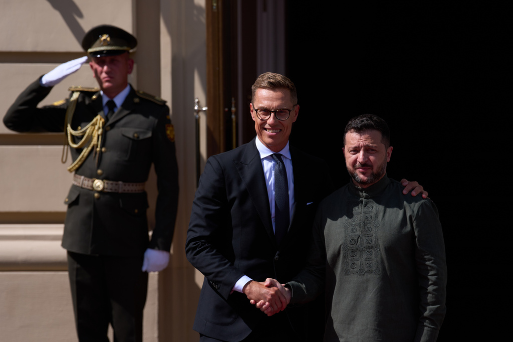 Finland's President Alexander Stubb, left, is welcomed by President Volodymyr Zelenskyy during a Ukrainian and Nordic-Baltic countries summit in Kyiv, Sunday, Aug. 23, 2026. (AP Photo/Francisco Seco)