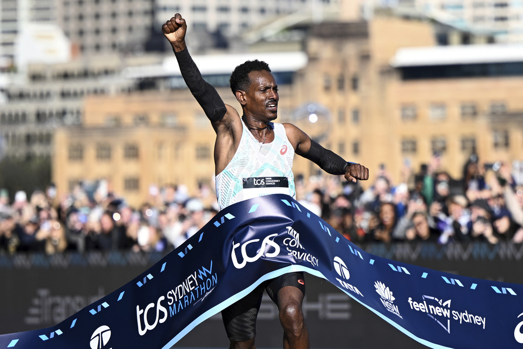 Ethiopian Hailemaryam Kiros reacts as he crosses the finish line to win the Sydney Marathon in Sydney, Sunday, Aug. 31, 2025. (Bianca De Marchi/AAP Image via AP)