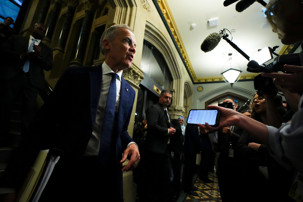 Prime Minister Mark Carney arrives to a caucus meeting in Ottawa on Wednesday, June 10, 2026. (Sean Kilpatrick/The Canadian Press via AP)