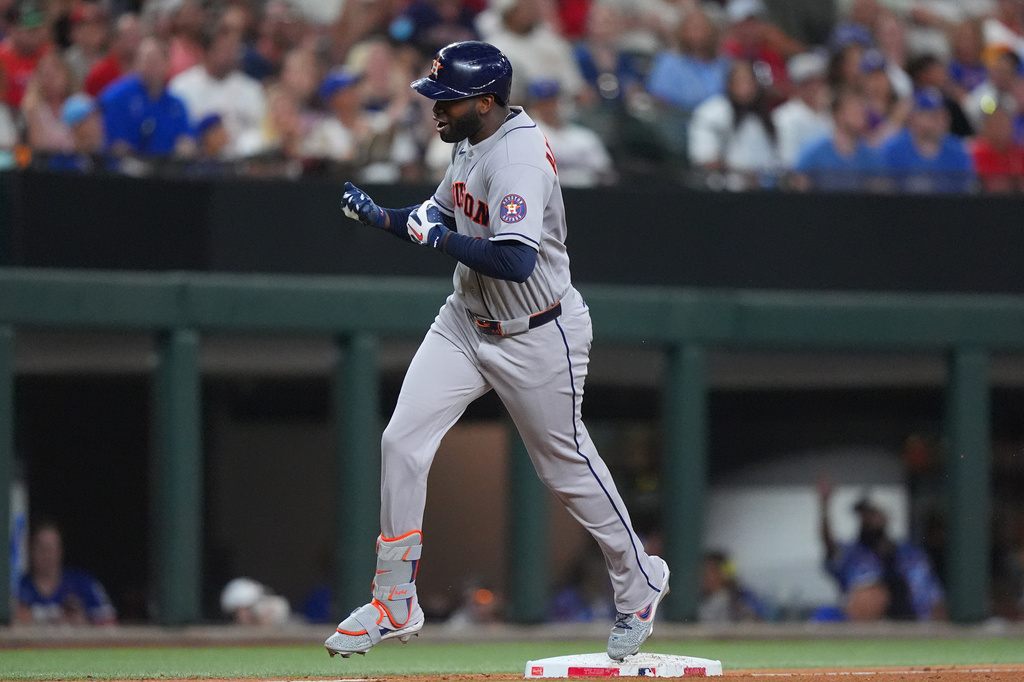 Houston Astros' Yordan Alvarez rounds third base after hitting a home run during the sixth inning of a baseball game against the Texas Rangers, Friday, July 10, 2026, in Arlington, Texas. (AP Photo/LM Otero)
