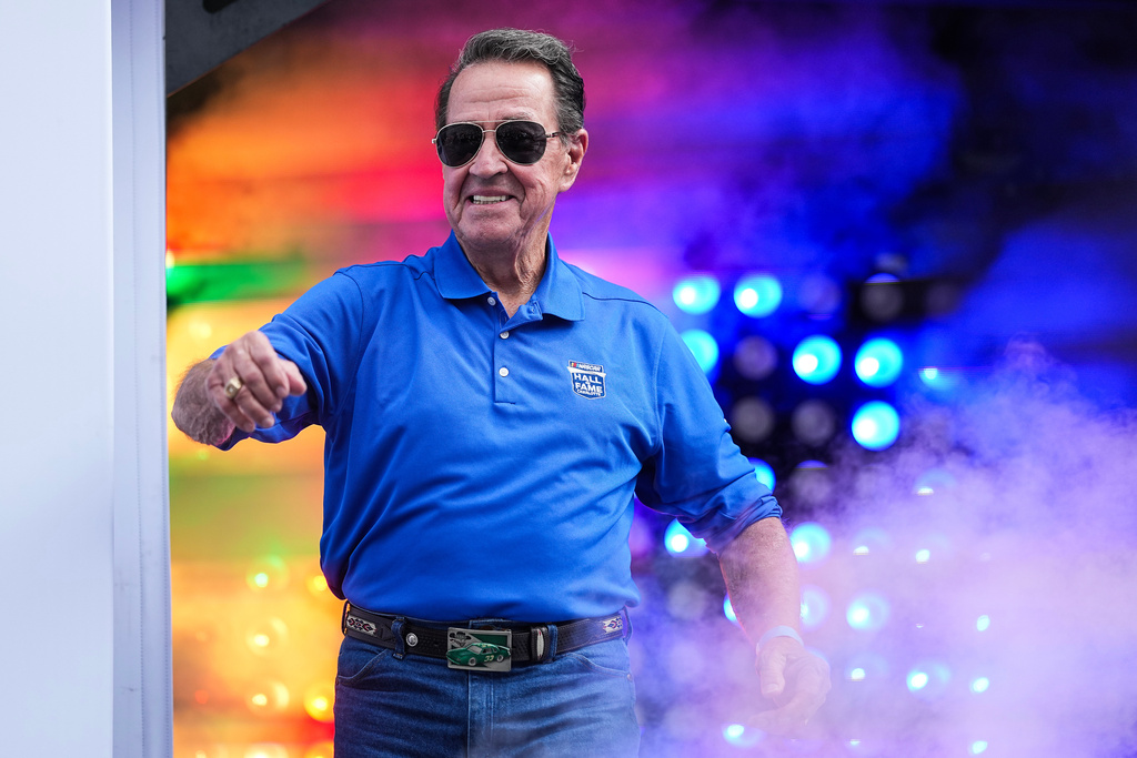 FILE - Former driver Harry Gant is introduced to fans as an inductee into the Hall of Fame class of 2026 prior to a NASCAR Cup Series auto race at Charlotte Motor Speedway, Sunday, Oct. 5, 2025, in Concord, N.C. (AP Photo/Matt Kelley,File)