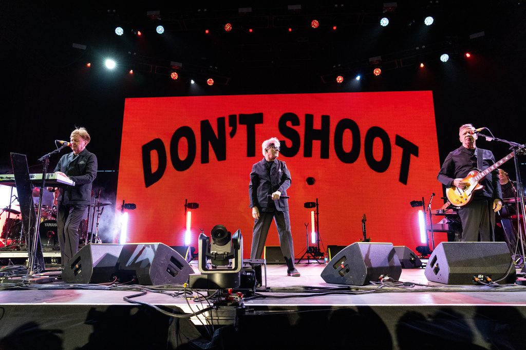 Gerald Casale, from left, Mark Mothersbaugh, and Bob Mothersbaugh of Devo performs during the first weekend of Coachella Valley Music and Arts Festival on Friday, April 10, 2026, in Indio, Calif. (Photo by Amy Harris/Invision/AP)