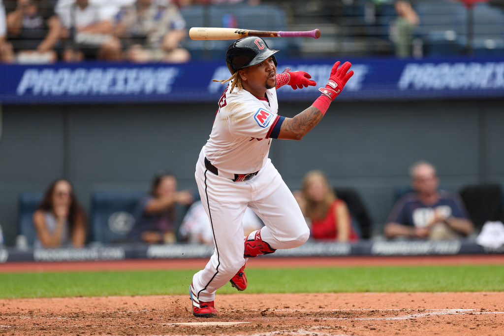 Cleveland Guardians' José Ramírez starts ti run after hitting a single against the Kansas City Royals in the sixth inning of a baseball game in Cleveland, Sunday, Aug. 30, 2026. (AP Photo/Tim Phillis)