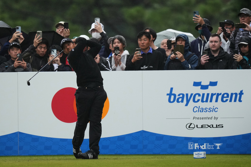 Xander Schauﬀele, of the U.S., tees off on the 15th hole during the third round of the Baycurrent Classic golf tournament at the Yokohama Country Club in Yokohama, near Tokyo, Saturday, Oct. 11, 2025. (AP Photo/Hiro Komae)
