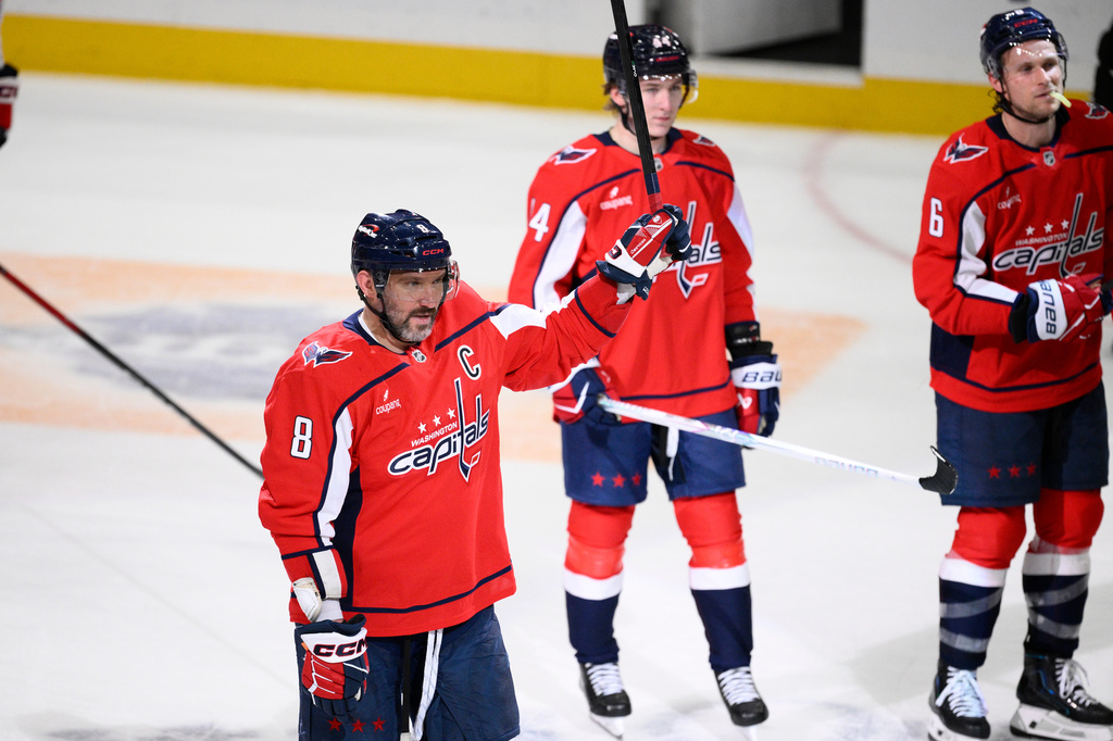 Washington Capitals left wing Alex Ovechkin (8) salutes the fans after an NHL hockey game against the Pittsburgh Penguins, Sunday, April 12, 2026, in Washington. (AP Photo/Nick Wass)