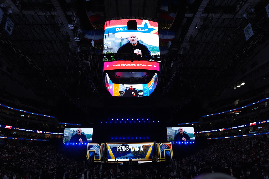 Pennsylvania Sen. John Fetterman introduces Sen. Dave McCormick at the Republican convention in Dallas, Wednesday, Sept. 9, 2026. (AP Photo/Tony Gutierrez)