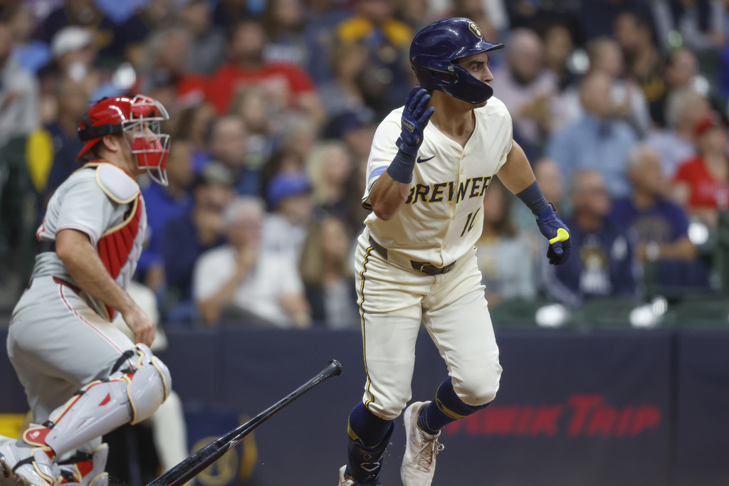 Milwaukee Brewers' Sal Frelick (10) hits a two-run single during the first inning of a baseball game against the Philadelphia Phillies, Wednesday, Sept. 3, 2025, in Milwaukee. (AP Photo/Jeffrey Phelps)