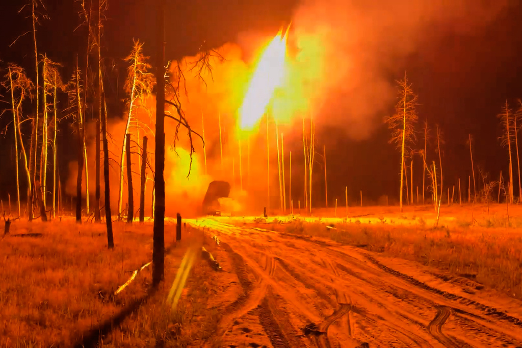 In this image made from video provided by Russian Defense Ministry Press Service on Tuesday, June 30, 2026, Russian TOS-1 Solntsepyok heavy flamethrower rocket launcher fires towards the Ukrainian positions. (Russian Defense Ministry Press Service via AP)