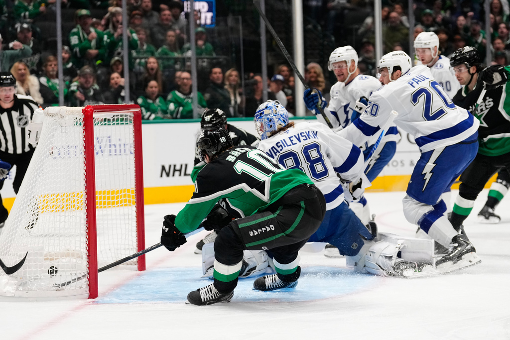 Dallas Stars center Oskar Back (10) scores as Tampa Bay Lightning goaltender Andrei Vasilevskiy (88) defends the net in the first period of an NHL hockey game in Dallas, Sunday, Jan. 18, 2026. (AP Photo/Tony Gutierrez)