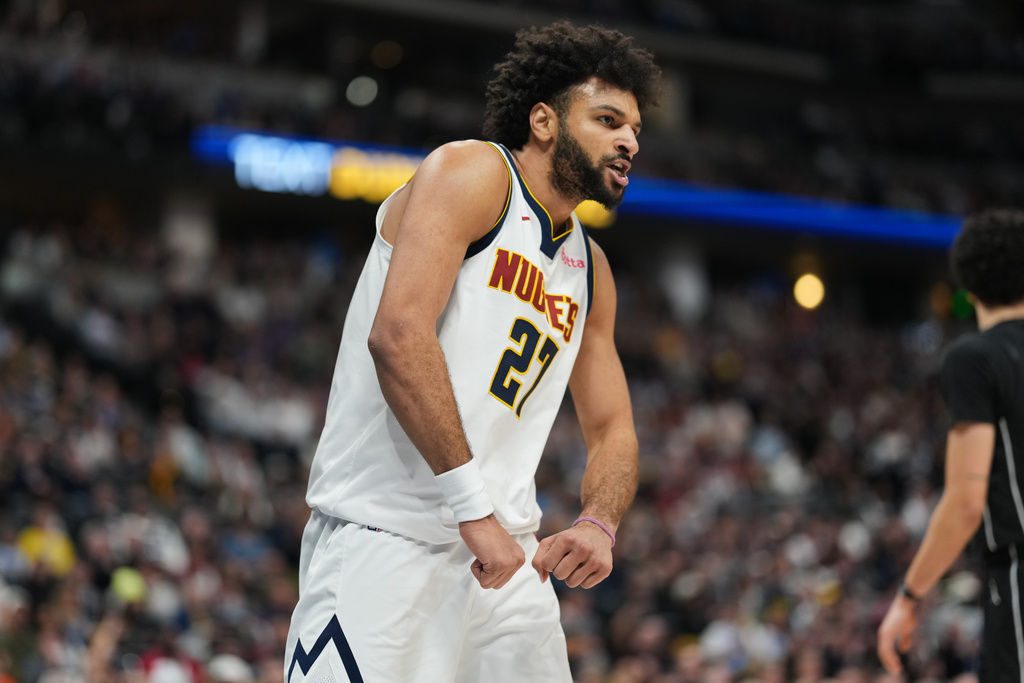 Denver Nuggets guard Jamal Murray reacts after dunking the ball for a basket and drawing a foul in the second half of an NBA basketball game against the Brooklyn Nets Thursday, Jan. 29, 2026, in Denver. (AP Photo/David Zalubowski)