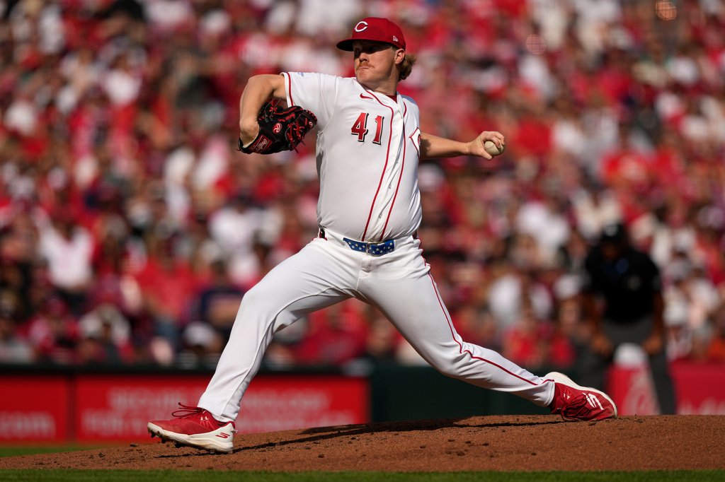 Cincinnati Reds pitcher Andrew Abbott throws during the second inning of an opening-day baseball game against the Boston Red Sox in Cincinnati, Thursday, March 26, 2026. (AP Photo/Carolyn Kaster)