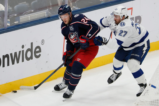 Columbus Blue Jackets' Mathieu Olivier, left, controls the puck as Tampa Bay Lightning's Ryan McDonagh defends during the second period of an NHL hockey game Saturday, Oct. 18, 2025, in Columbus, Ohio. (AP Photo/Jay LaPrete) Columbus Blue Jackets' Mathieu Olivier, left, controls the puck as Tampa Bay Lightning's Ryan McDonagh defends during the second period of an NHL hockey game Saturday, Oct. 18, 2025, in Columbus, Ohio. (AP Photo/Jay LaPrete)