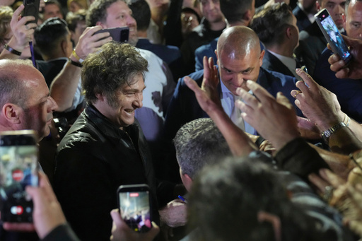 Argentina's President Javier Milei smiles to supporters after winning in legislative midterm elections in Buenos Aires, Argentina, Sunday, Oct. 26, 2025. (AP Photo/Rodrigo Abd) Argentina's President Javier Milei smiles to supporters after winning in legislative midterm elections in Buenos Aires, Argentina, Sunday, Oct. 26, 2025. (AP Photo/Rodrigo Abd)