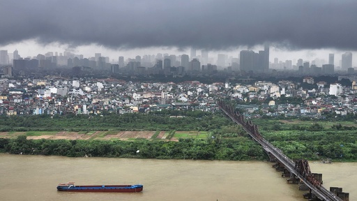 Dark clouds hang over the Hanoi skyline and the Red River after Typhoon Bualoi swept across the country, in Hanoi, Vietnam, Monday, Sept. 29, 2025. (AP Photo/Dan Dockery) Dark clouds hang over the Hanoi skyline and the Red River after Typhoon Bualoi swept across the country, in Hanoi, Vietnam, Monday, Sept. 29, 2025. (AP Photo/Dan Dockery)