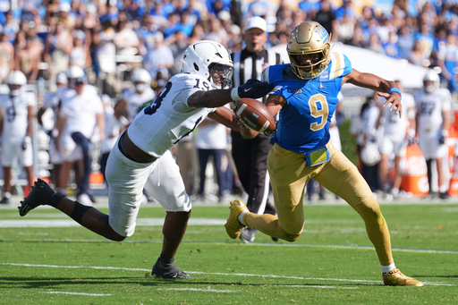 UCLA quarterback Nico Iamaleava (9) runs past Penn State defensive end Chaz Coleman (19) during the second half of an NCAA college football game Saturday, Oct. 4, 2025, in Pasadena, Calif. (AP Photo/Marcio Jose Sanchez) UCLA quarterback Nico Iamaleava (9) runs past Penn State defensive end Chaz Coleman (19) during the second half of an NCAA college football game Saturday, Oct. 4, 2025, in Pasadena, Calif. (AP Photo/Marcio Jose Sanchez)