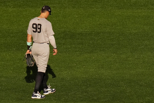 New York Yankees right fielder Aaron Judge (99) looks on during a break in play during the second inning in Game 1 of baseball's American League Division Series against the Toronto Blue Jays, Saturday, Oct. 4, 2025, in Toronto. (Chris Young/The Canadian Press via AP) New York Yankees right fielder Aaron Judge (99) looks on during a break in play during the second inning in Game 1 of baseball's American League Division Series against the Toronto Blue Jays, Saturday, Oct. 4, 2025, in Toronto. (Chris Young/The Canadian Press via AP)