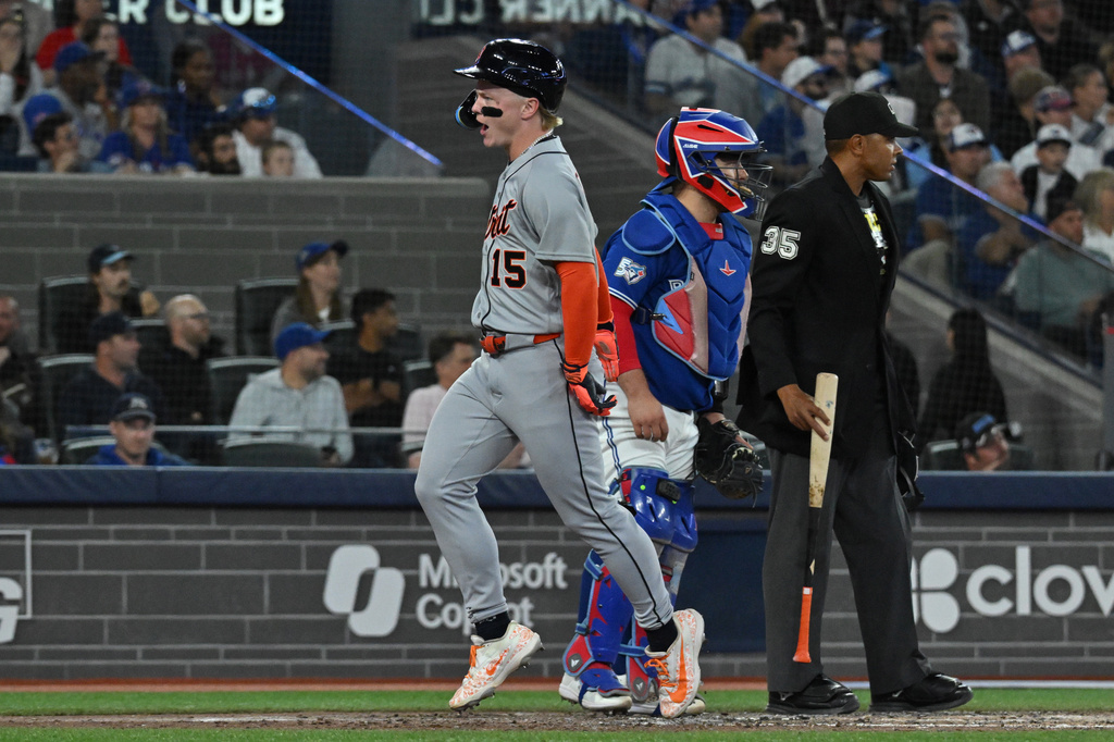 Detroit Tigers' Max Clark (15) scores on a double by Detroit Tigers' Spencer Torkelson during the seventh inning of a baseball game in Toronto on Monday, Sept. 14, 2026. (Jon Blacker/The Canadian Press via AP)