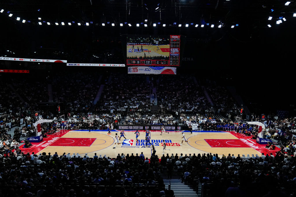 FILE - he Philadelphia 76ers play the New York Knicks during the first half of an NBA preseason basketball game, Thursday, Oct. 2, 2025, in Abu Dhabi, United Arab Emirates. (AP Photo/Altaf Qadri, File)
