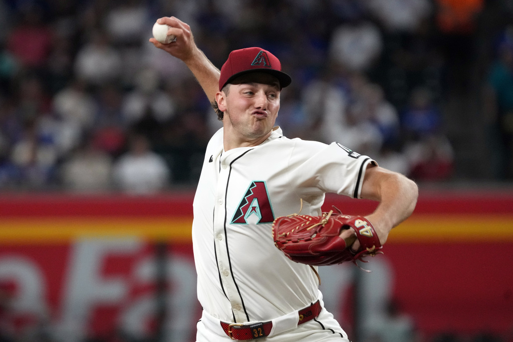 Arizona Diamondbacks pitcher Brandon Pfaadt throws against the Los Angeles Dodgers in the first inning of a baseball game, Tuesday, Sept. 23, 2025, in Phoenix. (AP Photo/Rick Scuteri)