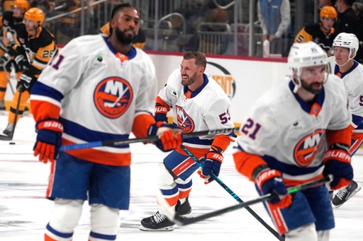 New York Islanders' Casey Cizikas, center, Anthony Duclair, left, and Kyle Palmieri (21) skate during warm ups before an NHL hockey game against the Pittsburgh Penguins in Pittsburgh, Thursday, Oct. 9, 2025. (AP Photo/Gene J. Puskar) New York Islanders' Casey Cizikas, center, Anthony Duclair, left, and Kyle Palmieri (21) skate during warm ups before an NHL hockey game against the Pittsburgh Penguins in Pittsburgh, Thursday, Oct. 9, 2025. (AP Photo/Gene J. Puskar)