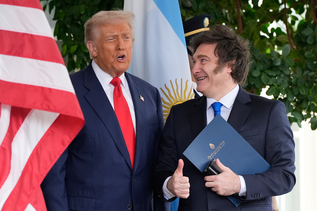 FILE - President Donald Trump greets Argentina's President Javier Milei at the White House, Oct. 14, 2025, in Washington. (AP Photo/Alex Brandon, File)