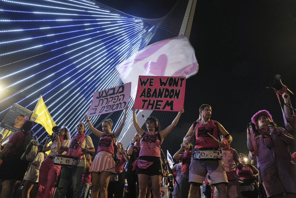 Relatives and supporters of Israeli hostages held in the Gaza Strip attend a rally demanding their release from Hamas captivity and calling for an end to the war, in Jerusalem, Saturday, Sept. 6, 2025. (AP Photo/Mahmoud Illean)