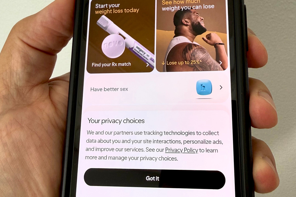 The Hims website is displayed on a smartphone in Philadelphia on Wednesday, Sept. 16, 2026. (AP Photo/Jonathan Poet)