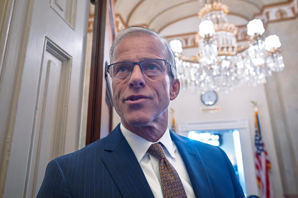 Senate Majority Leader John Thune, R-S.D., speaks to reporters as he arrives at his office after praising the late Sen. Lindsey Graham, R-S.C., at the Capitol in Washington, Monday, July 13, 2026. (AP Photo/J. Scott Applewhite)