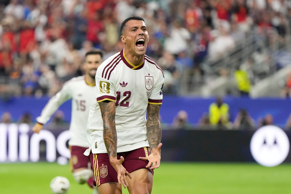 Spain's Pedro Porro reacts after scoring his side's second goal during the World Cup semifinal soccer match between France and Spain in Arlington, Texas, near Dallas, Tuesday, July 14, 2026. (AP Photo/Ashley Landis)