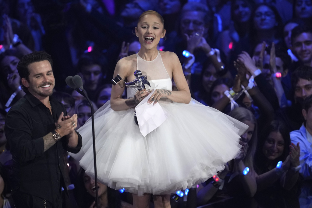Christian Breslauer, left, and Ariana Grande accept the award for video of the year for "Brighter Days Ahead" during the MTV Video Music Awards on Sunday, Sept. 7, 2025, at UBS Arena in Elmont, N.Y. (Photo by Charles Sykes/Invision/AP)