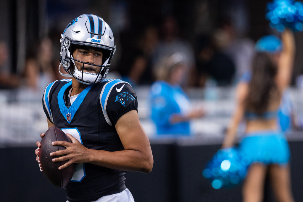 Carolina Panthers quarterback Bryce Young (9) warms up during the NFL football team's fan fest Friday, July 31, 2026, in Charlotte, N.C. (AP Photo/Scott Kinser)